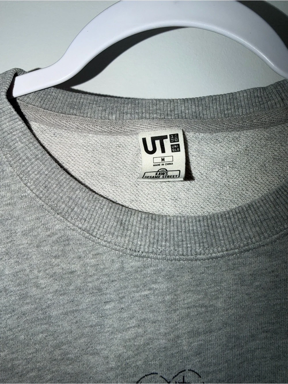 Uniqlo KAWS x sesame street crewneck